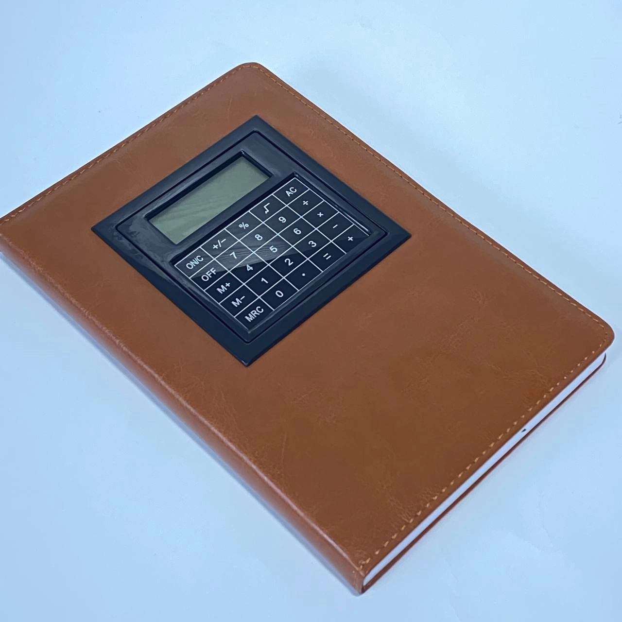 Блокнот с калькулятором 7666 (100 листов) коричневый недорого