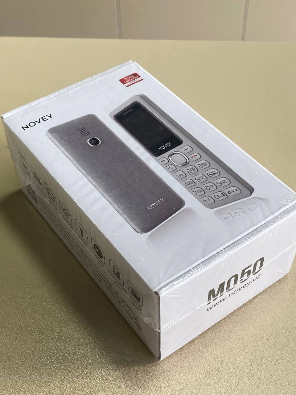 Novey M050 kumushrang telefoni O'zbekistonda